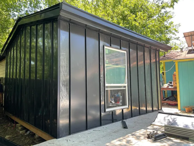 Black standing seam metal wall panels for Roof Inspection in Moultonborough